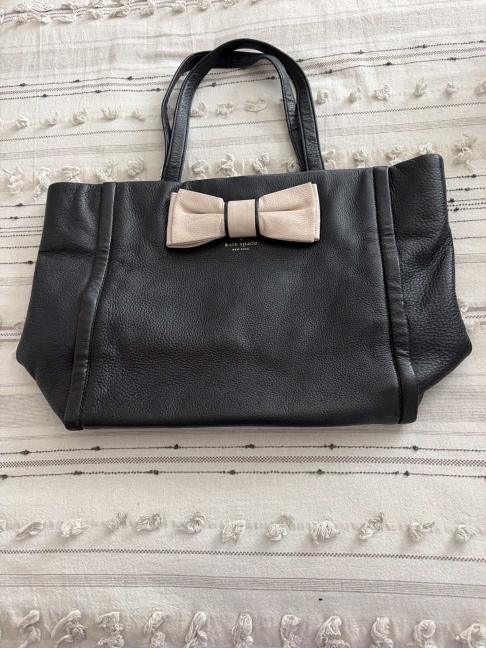 kate spade black leather tote with cream bow accent